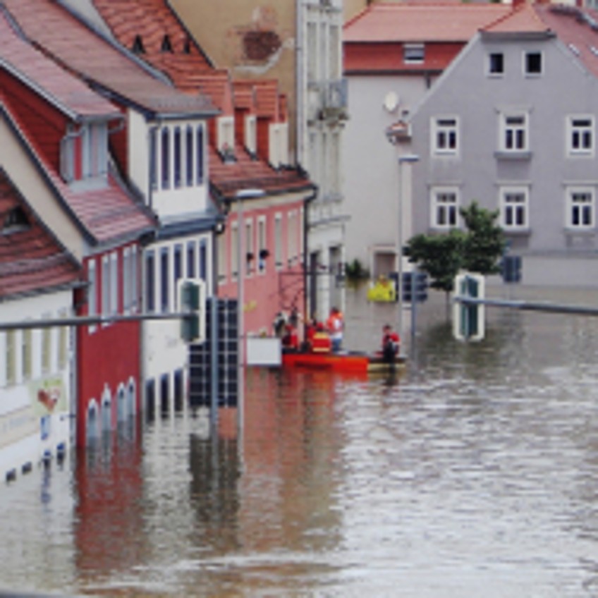 Schlagzeile - Hochwasser und Häuser