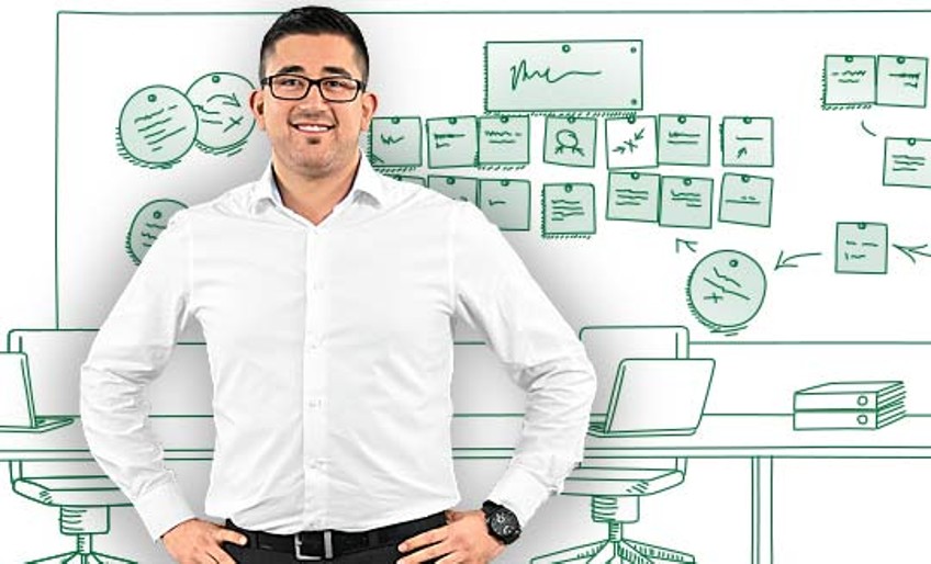 DEVK-Ausbildung - Auszubildender vor Metaplaner
